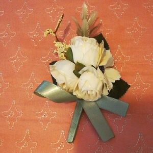 Elegant Cream Floral Boutonniere with Green Ribbon